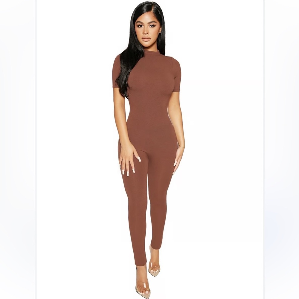 NWOT’S NAKED WARDROBE JUMPSUIT!